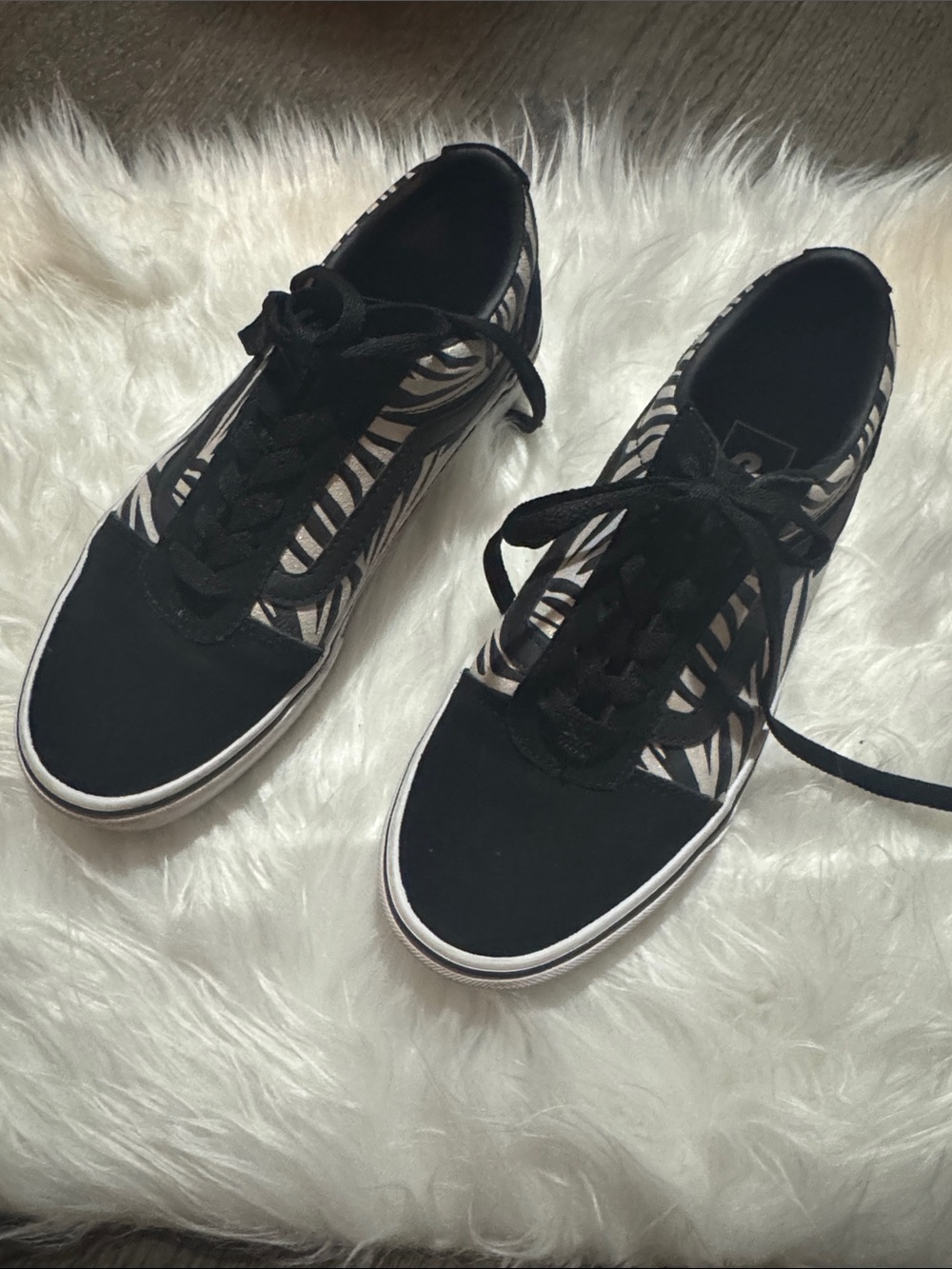 Vans Black Zebra Print Lace-Up Sneakers with iridescent shimmer.